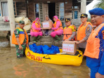 Dusun Muara Sako Terendam Luapan Sungai Kampar, Kapolres Pelalawan Berkunjung Langsung Memberikan Bantuan