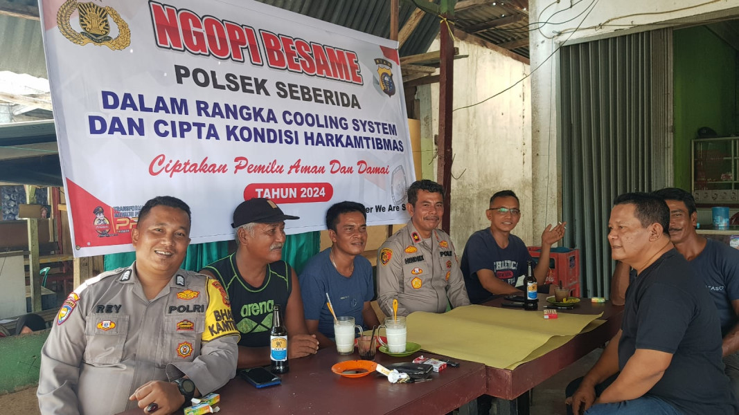 Kapolsek Seberida Duduk Bersama Warga Sei Bangkar, Ajak Sukseskan Pemilu