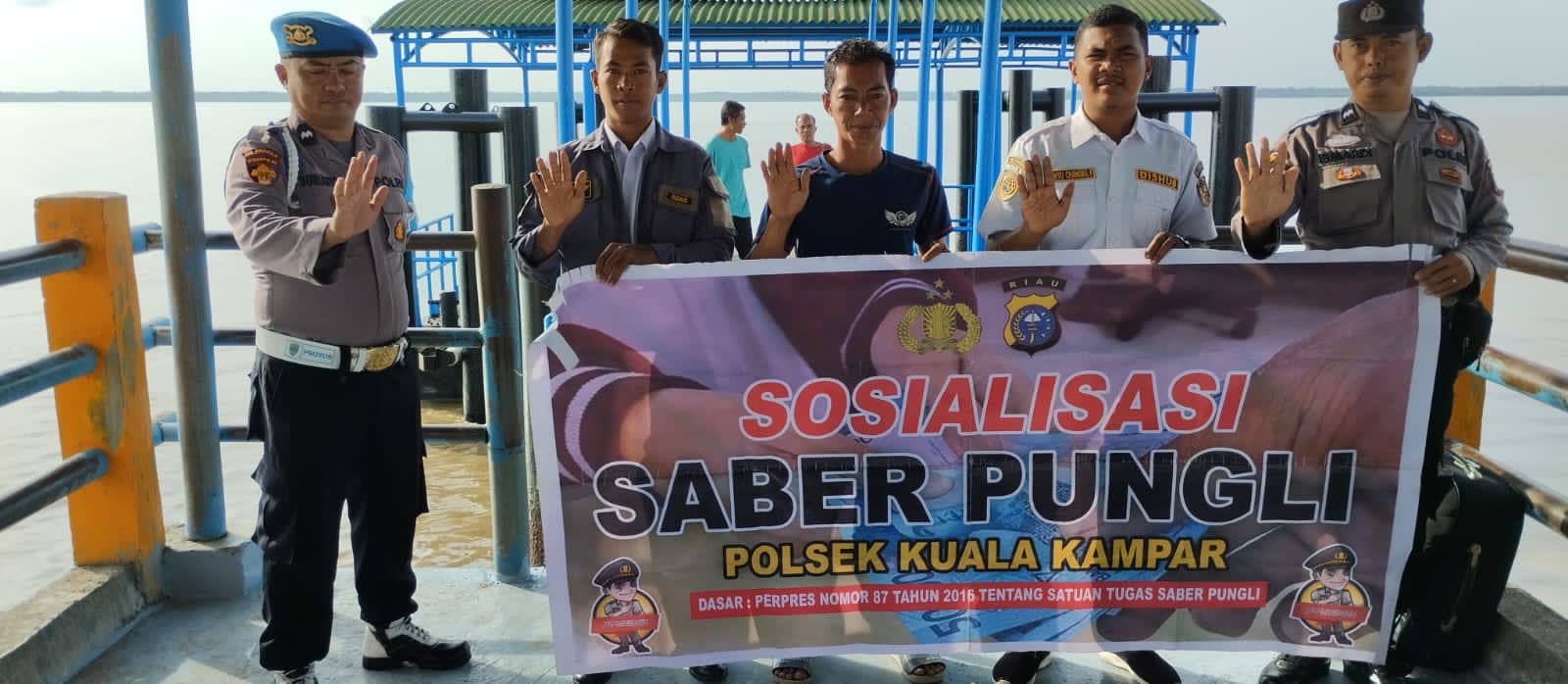 Polsek Kuala Kampar  Giat Sosialisasi  Satgas Saber Pungli  Di Dermaga