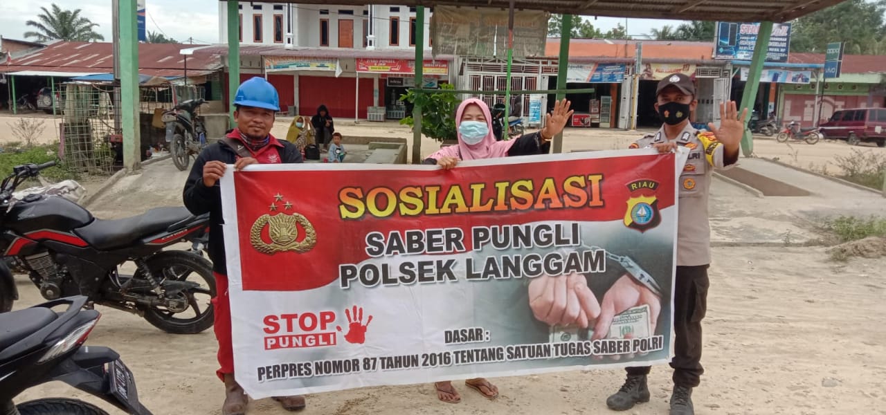 Sosialisasikan Pungli, Polsek Langgam Ajak Masyarakat Ciptakan Lingkungan Aman