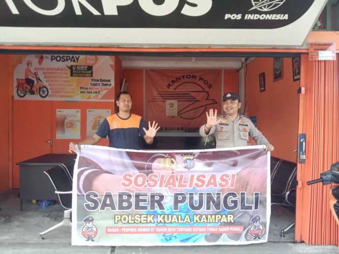 Polsek Kuala Kampar  Giat Sosialisasi  Satgas Saber Pungli  di Kantor Pos