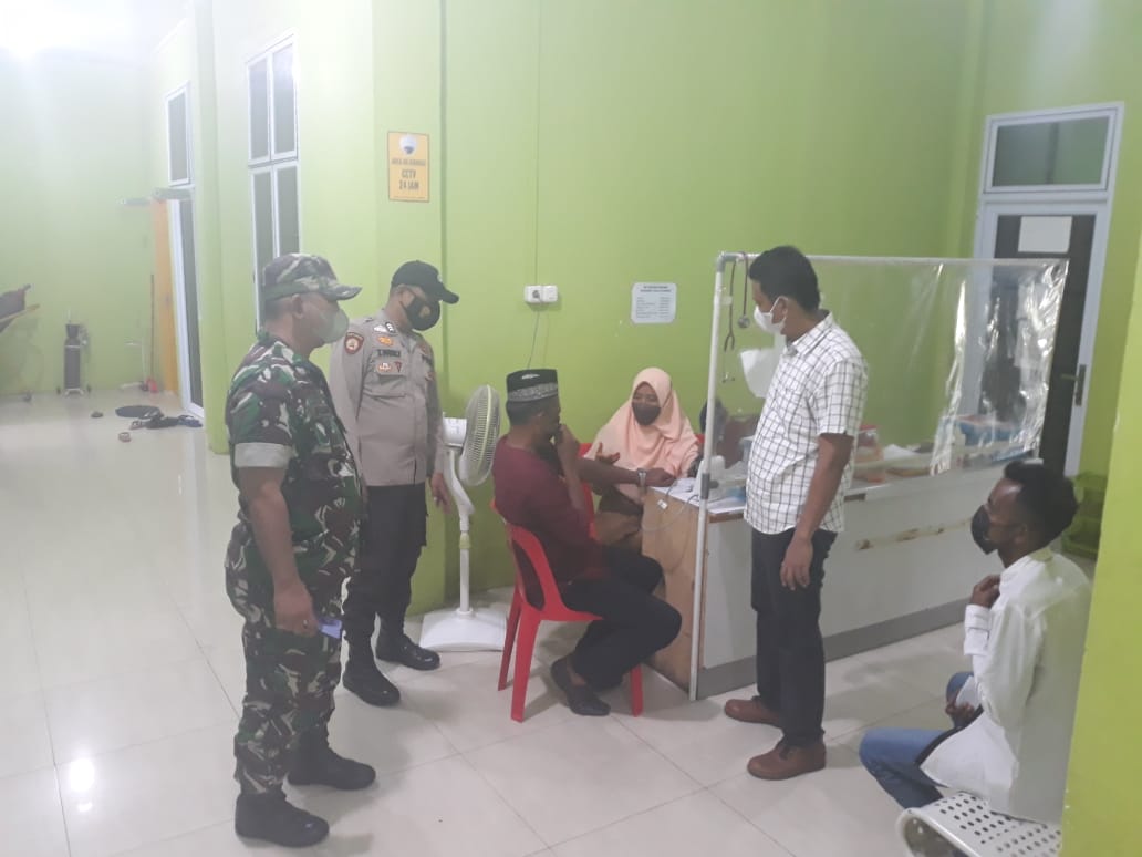 Polsek Kuala Kampar Ikut Mengawal Kegiatan Giat Vaksinasi Di Blud Puskesmas