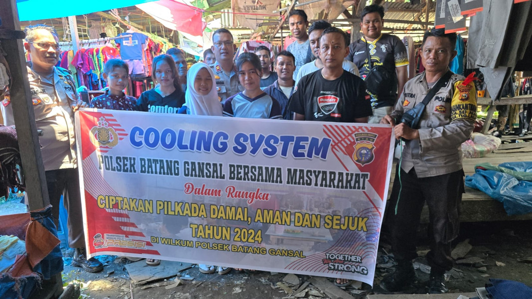 Polsek Batang Gansal Gelar Cooling System di Pasar Rakyat untuk Pilkada Damai 2024