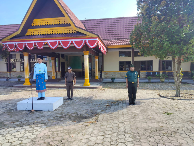 Danramil 03/Minas Diwakili Serma Muhammad Nasir Hadiri Upacara Peringatan HUT Riau Ke-66