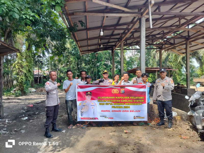 Kapolsek Kelayang Ajak Buruh Bongkar Muat Jaga Kamtibmas dan Lawan Golput