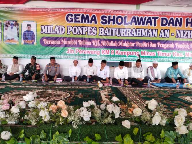 Danramil Minas Diwakili Serda Mayus Maruli Hadiri Kegiatan Gema Sholawat & Haflah Milad Ponpes Baiturrahman An Nizom Ke-8 di Minas Timur 