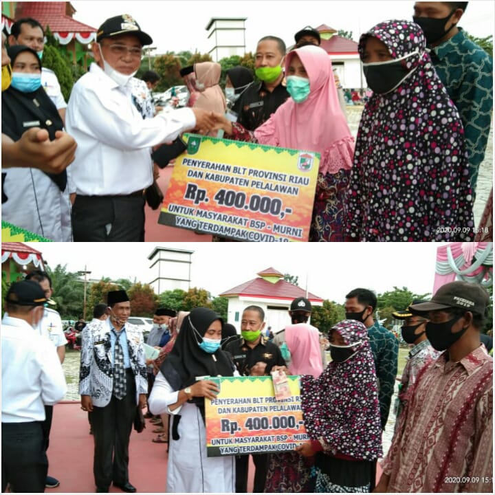 Bupati Pelalawan Serahkan  BLT Pemprov Riau & Kabupaten Pelalawan Di Kecamatan Teluk Meranti