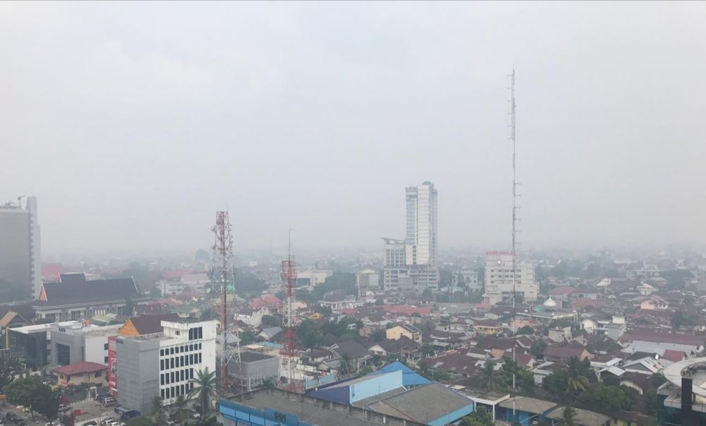Kota Pekanbaru Mulai Diselimuti Asap, Jarak Pandang Terpantau 5 Kilometer