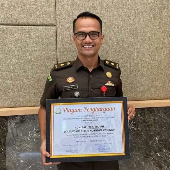 Roni Saputra, Kasi Pidsus Terbaik Riau Mendapat Promosi Jabatan