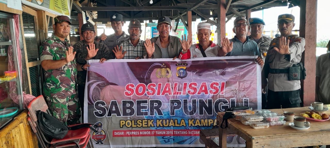 Plh Kapolsek Kuala Kampar  Pimpin Sosialisasi  Satgas Saber Pungli  Di Ruang Tunggu Pelabuhan