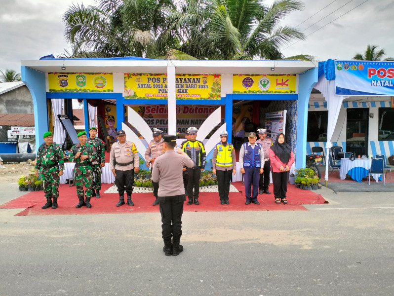 Sejumlah Anggota Koramil 03/Minas Ikuti Pelaksanaan Apel Pengecekan Pos Pengamanan Nataru di Simpang Exit Tol Minas