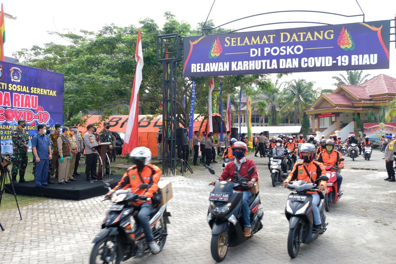 Aksi Bansos Serentak Polda Riau Peduli Covid-19 Libatkan 200 Ri-Jek