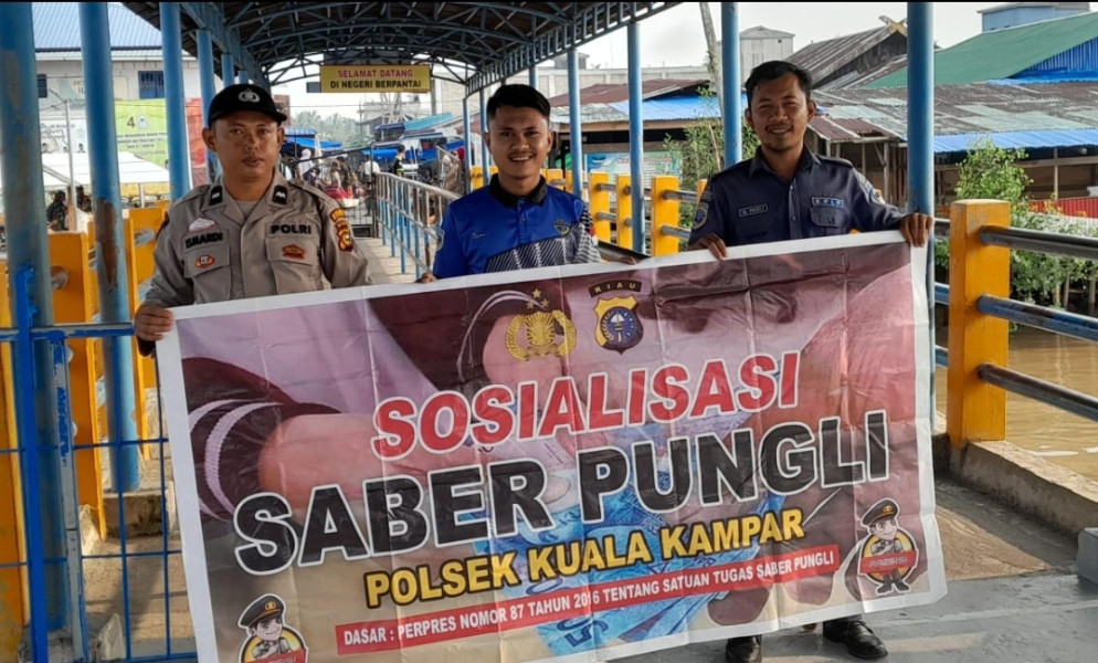 Polsek Kuala Kampar  Sosialisasi  Saber Pungli Di Pelabuhan Penyalai