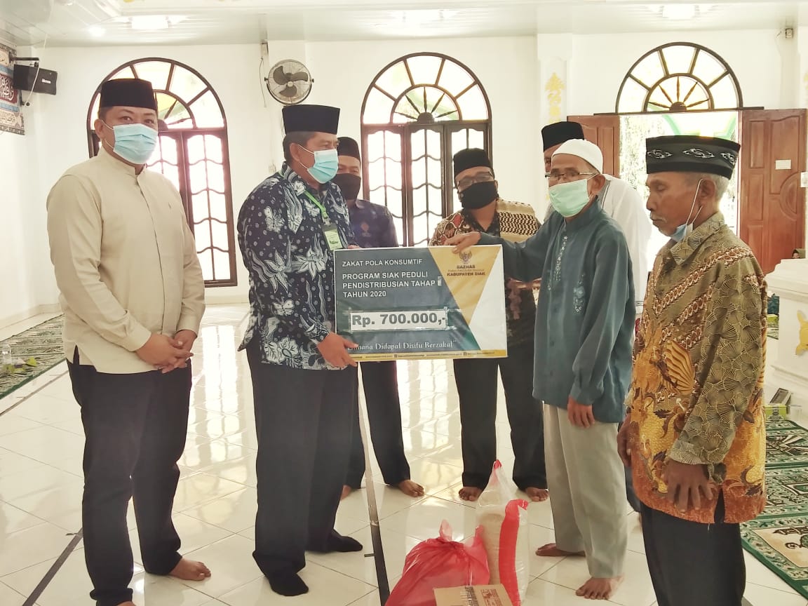 Baznas-Siak Salurkan Bantuan Warga Koto Gasib Terdampak Covid-19