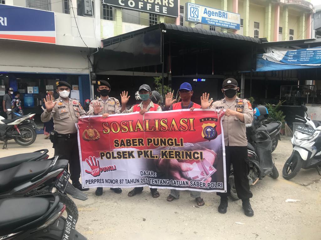 Polsek Pangkalan Kerinci Sosialisasi Pungutan Liar di Beberapa Titik