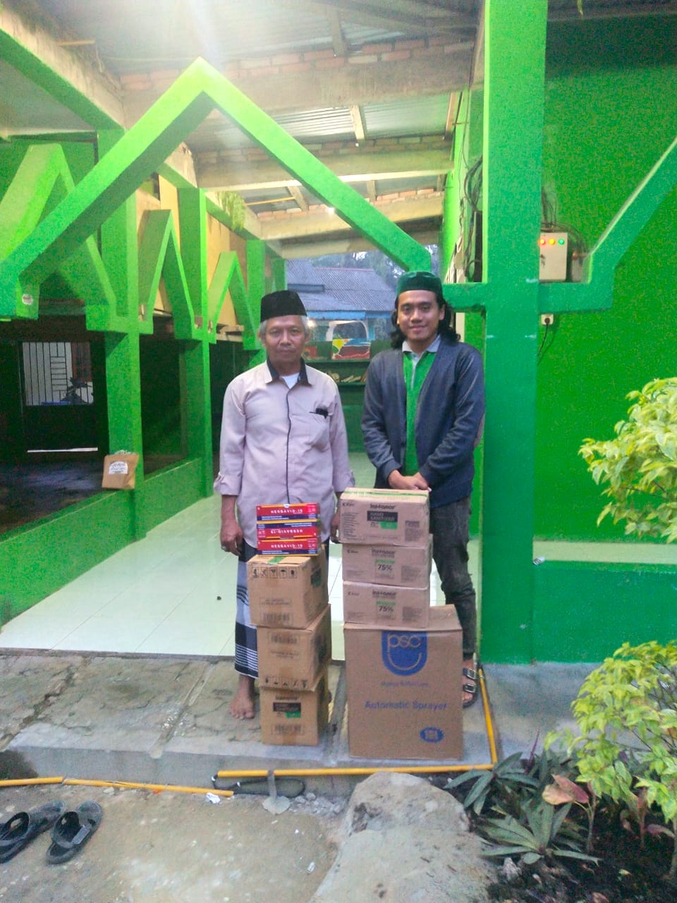 Pimpinan Cabang GP Ansor Pelalawan Distribusikan Bantuan Prokes PP Siak