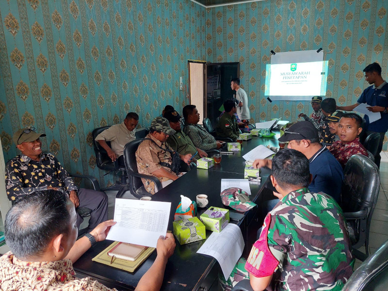 Babinsa Kopda L Sigalingging Hadiri Rapat Rencana Kerja Kampung Kuala Gasib TA 2025